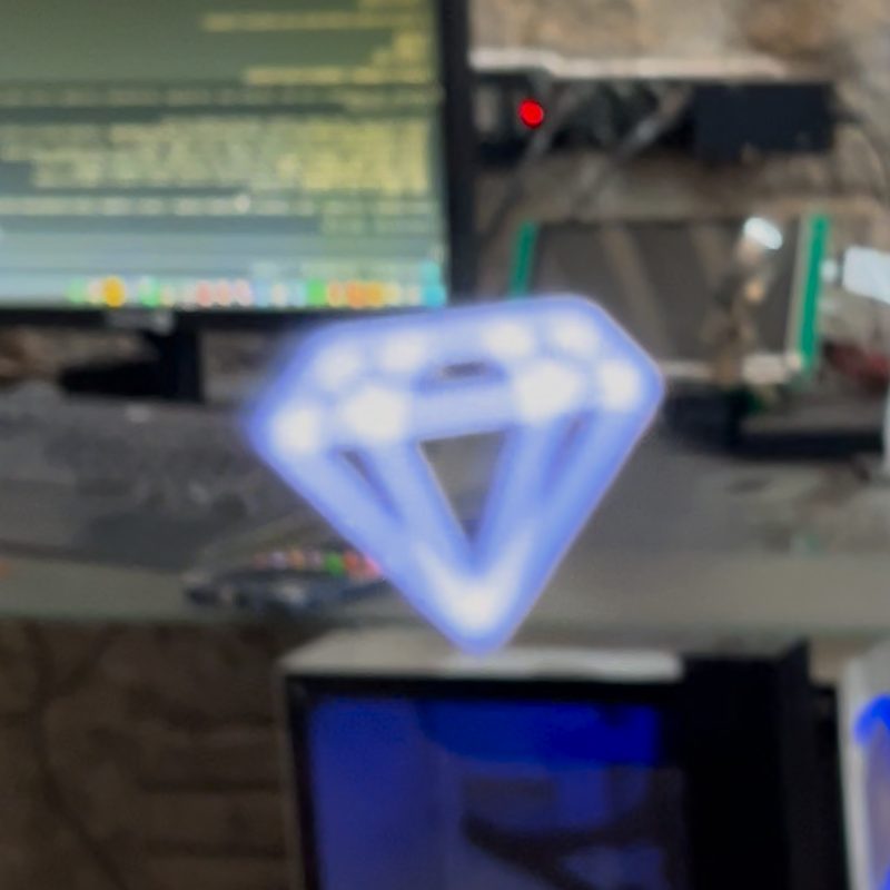 Ícone do touch aceso no vidro de um espelho Clear Mirror Linha Lume